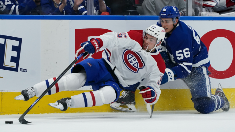 The Maple Leafs have recalled defenseman Kristians Rubins, seen here in action during the pre-season. (CP)