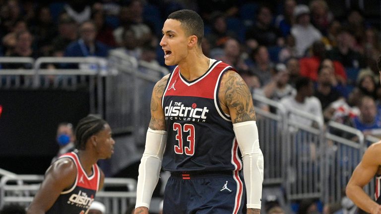 Washington Wizards forward Kyle Kuzma (33) reacts after scoring a 3-pointer during the second half of the team's NBA basketball game against the Orlando Magic, Saturday, Nov. 13, 2021, in Orlando, Fla. (Phelan M. Ebenhack/AP)