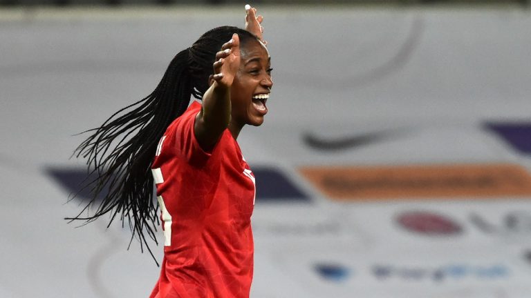 Canada's Nichelle Prince celebrates after scores the second goal against England during the women's international friendly soccer match between England and Canada at Bet365 stadium in Stoke on Trent, England, Tuesday, April 13, 2021. (Rui Vieira/AP)