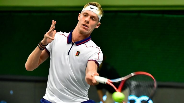 Canada's Denis Shapovalov returns a shot to Tommy Paul of the US, during the men's final match of the ATP Stockholm Open tennis tournament in Stockholm, Saturday Nov. 13, 2021. (Jonas Ekstromer/TT via AP) 
