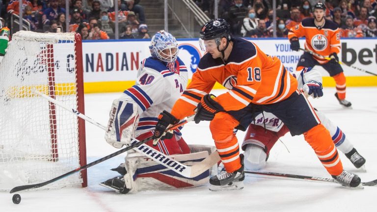 New York Rangers goalie Alexandar Georgiev (40) makes the save on Edmonton Oilers' Zach Hyman (18) during second period NHL action in Edmonton on Friday, November 5, 2021. (Jason Franson/CP)