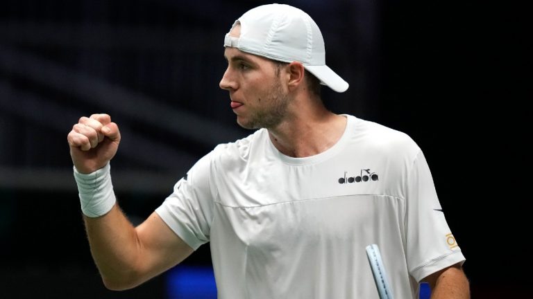 Germany's Jan-Lennard Struff reacts in his match against Great Britain's Cameron Norrie during a Davis Cup quarter final match match between Great Britain and Germany in Innsbruck, Austria, Tuesday, Nov. 30, 2021. (Michael Probst Photo via AP) 