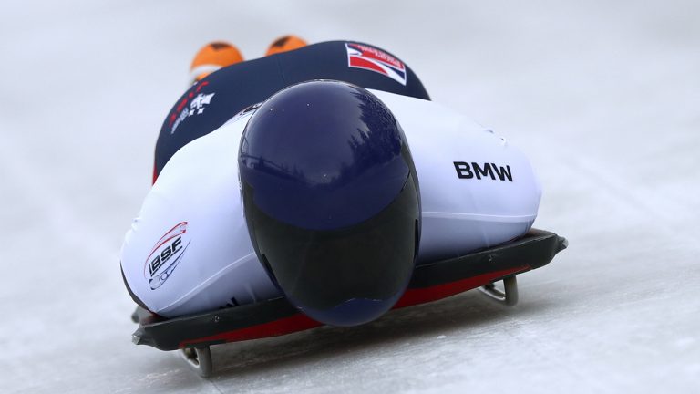 Matt Weston of Britain starts his first heat at the men's Skeleton World Cup race in Igls, near Innsbruck, Austria, Friday, Dec. 11, 2020. (Matthias Schrader/AP Photo)