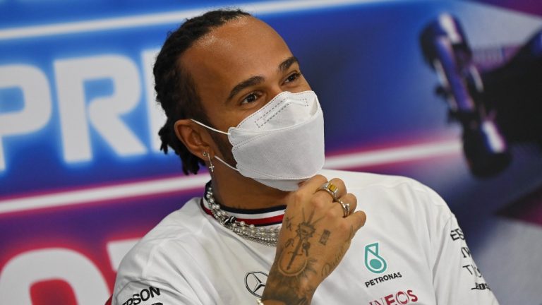 Mercedes driver Lewis Hamilton speaks during a press conference ahead of the Qatar Formula One Grand Prix. (Andrej Isakovic, Pool Photo via AP)