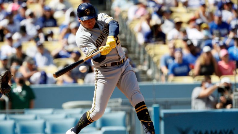 Milwaukee Brewers' Avisail Garcia hits an RBI-double to score Rowdy Tellez during the fourth inning of a baseball game against the Los Angeles Dodgers in Los Angeles, Sunday, Oct. 3, 2021. (Alex Gallardo/AP)