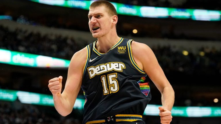 Denver Nuggets center Nikola Jokic shouts at an official after sinking a shot in the second half of an NBA basketball game against the Dallas Mavericks in Dallas, Monday, Nov. 15, 2021 (Tony Gutierrez/AP).