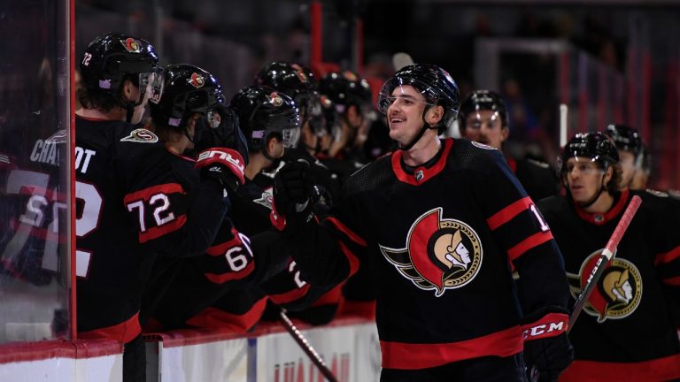 Ottawa Senators' Drake Batherson (19) celebrates his goal against the Pittsburgh Penguins with Thomas Chabot (72) during third period NHL hockey action in Ottawa, on Saturday, Nov. 13, 2021 (Justin Tang/CP).