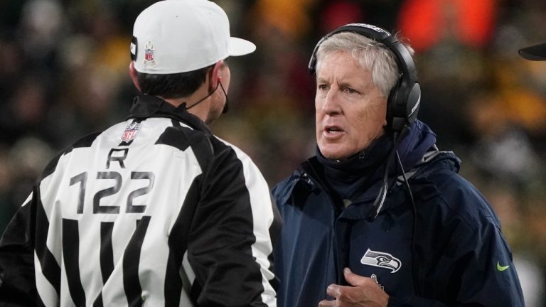 Seattle Seahawks head coach Pete Carroll argues with referee Brad Allen (122) during the second half of an NFL football game against the Green Bay Packers Sunday, Nov. 14, 2021, in Green Bay, Wis. (Morry Gash/AP) 