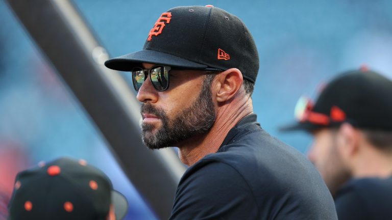 San Francisco Giants manager Gabe Kapler watches players take batting practice before Game 2 of a baseball National League Division Series against the Los Angeles Dodgersd Saturday, Oct. 9, 2021, in San Francisco. (John Hefti/AP)