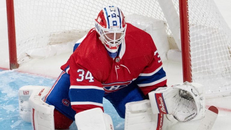 Montreal Canadiens goaltender Jake Allen (34) makes a stick save during third period NHL hockey action against the Detroit Red Wings Tuesday, November 2, 2021 in Montreal. (Ryan Remiorz/THE CANADIAN PRESS)
