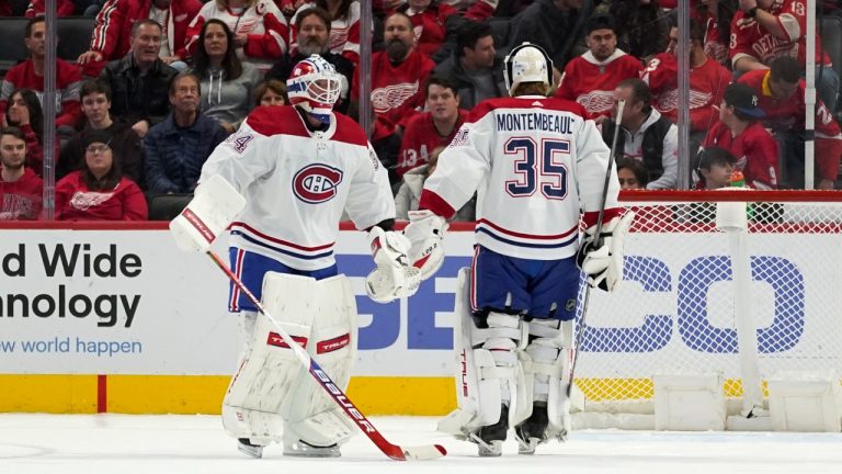 Montreal Canadiens goaltender Sam Montembeault (35) enters the game for Jake Allen (34) in the first period of an NHL hockey game against the Detroit Red Wings Saturday, Nov. 13, 2021, in Detroit. (AP) 
