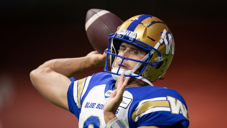 Winnipeg Blue Bombers quarterback Zach Collaros warms up before a CFL football game against the B.C. Lions in Vancouver, on Friday, October 1, 2021. (Darryl Dyck/THE CANADIAN PRESS)
