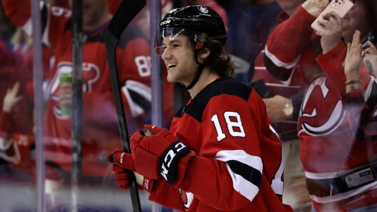 New Jersey Devils centre Dawson Mercer reacts after scoring a goal against the New York Islanders during the third period of an NHL hockey game Thursday, Nov. 11, 2021, in Newark, N.J. The Devils won 4-0. (Adam Hunger/AP) 