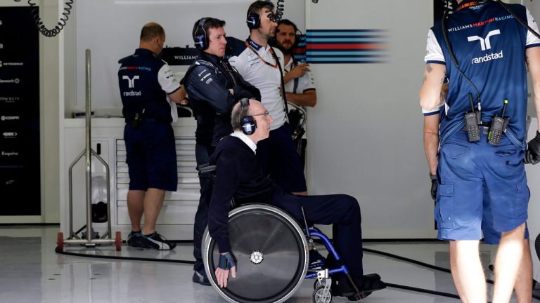 Principal of Williams team Sir Frank Williams, center, watches a monitor in his team's garage during the third free practice ahead of the Bahrain Formula One Grand Prix at the Formula One Bahrain International Circuit. (Hassan Ammar/AP) 