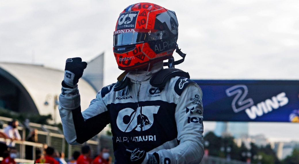 Race winner Pierre Gasly celebrates on the podium with the trophy