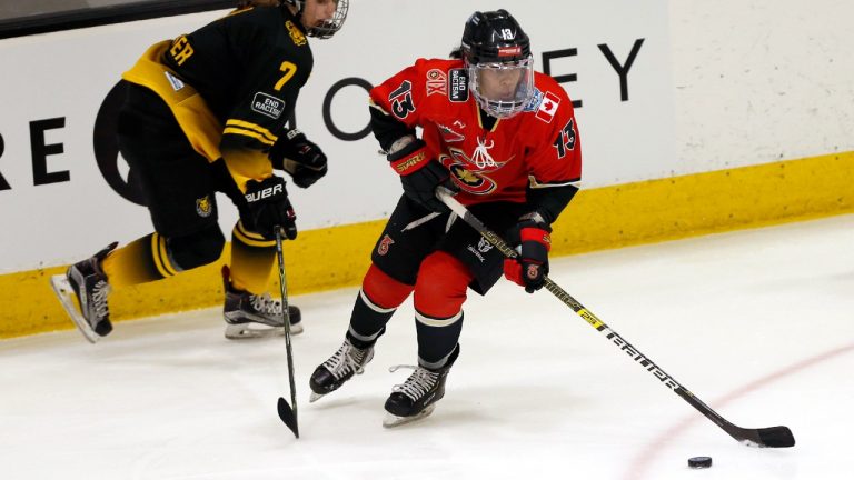 Toronto Six forward Mikyla Grant-Mentis (13) looks to pass the puck during the first period of a semifinal in the NWHL Isobel Cup hockey tournament Friday, March 26, 2021, in Boston. (Mary Schwalm/AP)