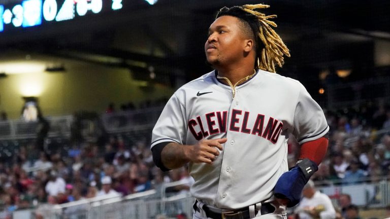 Cleveland third baseman Jose Ramirez heads to the dugout. (Jim Mone/AP) 