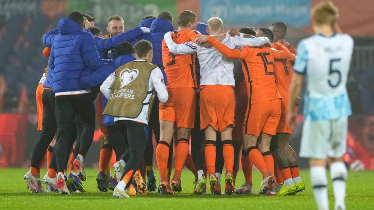 Netherlands players celebrate after their World Cup 2022 group G qualifying soccer win over Norway at De Kuip stadium. (Peter Dejong.AP) 