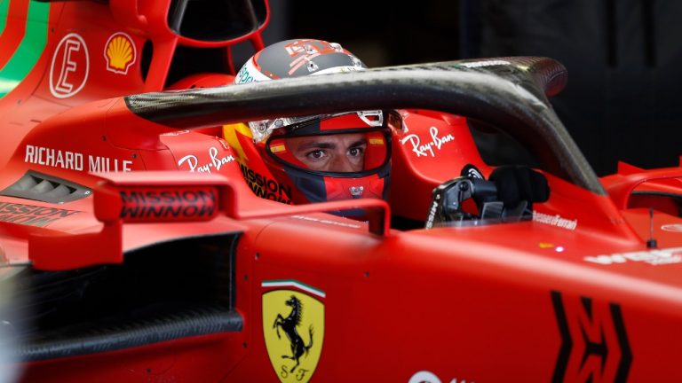 Ferrari driver Carlos Sainz, of Spain, waits in his car prior the start of the qualifying run of the Formula One Mexico Grand Prix auto race at the Hermanos Rodriguez racetrack in Mexico City, Saturday, Nov. 6, 2021. (Francisco Guasco/AP)