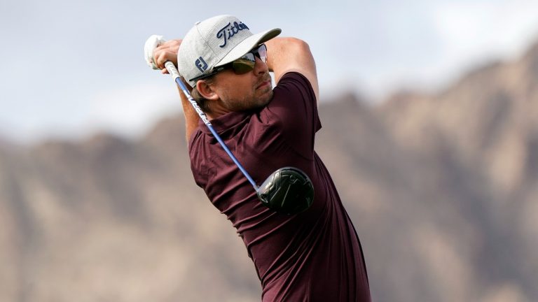 Roger Sloan hits from the first tee during the third round of The American Express golf tournament on the Pete Dye Stadium Course at PGA West, Saturday, Jan. 23, 2021, in La Quinta, Calif. (Marcio Jose Sanchez/AP Photo) 
