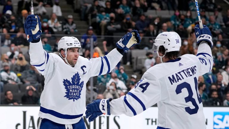 Toronto Maple Leafs centre John Tavares (91) celebrates with Auston Matthews (34) after scoring a goal against the San Jose Sharks during the second period of an NHL hockey game Friday, Nov. 26, 2021, in San Jose, Calif. (Tony Avelar/AP)