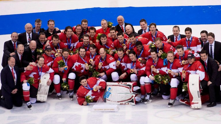 The men's Olympic hockey team is the Canadian Press team of the year. The squad that steamrolled through the Sochi Olympics on the way to a gold medal is the overwhelming choice by editors and broadcasters across the country. Canada poses for their team photo after defeating Sweden during third period finals hockey action at the 2014 Sochi Winter Olympics in Sochi, Russia on Sunday, February 23, 2014. (Nathan Denette/CP)