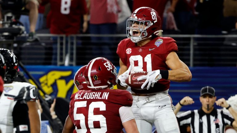 Alabama tight end Cameron Latu (81) celebrates after making a touchdown catch against Cincinnati during the second half of the Cotton Bowl NCAA College Football Playoff semifinal game, Friday, Dec. 31, 2021, in Arlington, Texas. (Michael Ainsworth/AP Photo) 
