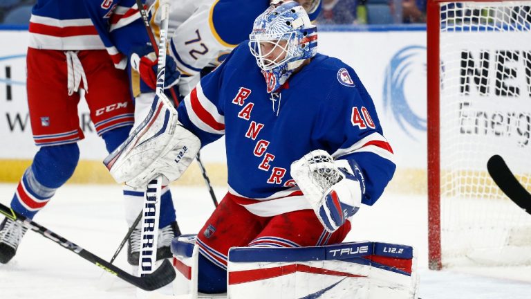 New York Rangers goaltender Alexandar Georgiev (40) makes a save during the first period of the team's NHL hockey game against the Buffalo Sabres, Friday, Dec. 10, 2021, in Buffalo, N.Y. (Jeffrey T. Barnes/AP) 