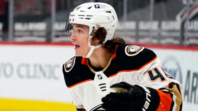 Anaheim Ducks center Trevor Zegras reacts after left wing Max Jones (49) scored a goal against the Arizona Coyotes in the first period during an NHL hockey game, Monday, Feb. 22, 2021, in Glendale, Ariz. (Rick Scuteri/AP)