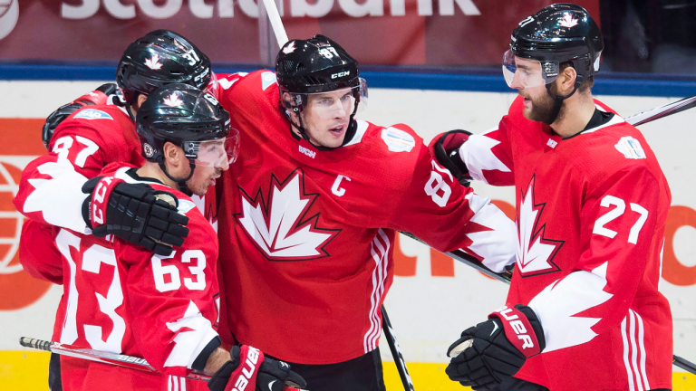 Team Canada forward Sidney Crosby (87) celebrates his goal with Patrice Bergeron (37), Brad Marchand (63) and Alex Pietrangelo (27) while playing against team Europe during the World Cup of Hockey in 2016. (CP)