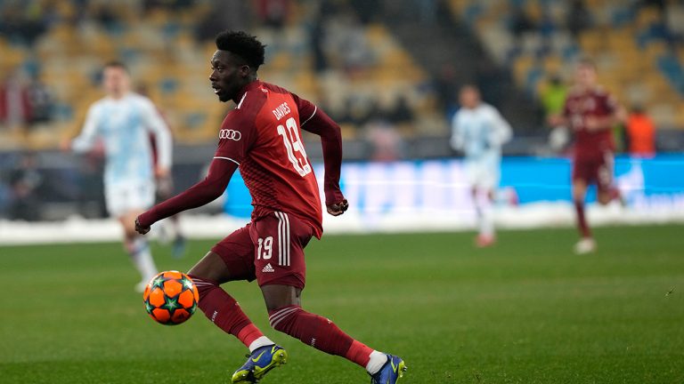 Bayern's Alphonso Davies controls the ball during the Champions League group E soccer match between Dynamo Kyiv and Bayern Munich, at the Olimpiyskiy Stadium in Kyiv, Ukraine, Tuesday, Nov. 23, 2021. (Efrem Lukatsky/AP)