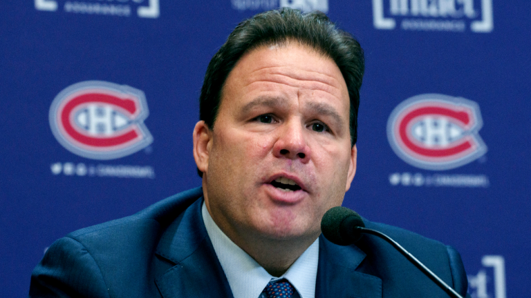 Montreal Canadiens Executive Vice President, Hockey Operations, Jeff Gorton responds to questions during a news conference in Brossard, Que. on Friday. (CP)