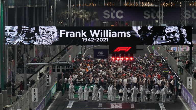 A tribute to Frank Williams is displayed before the start of the Formula One Saudi Arabian Grand Prix in Jiddah on Sunday. Williams, the much-loved and inspirational founder of the F1 team bearing his name, died last weekend. (AP)