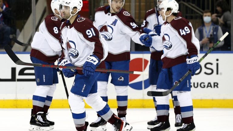 Colorado Avalanche center Nazem Kadri (91) reacts after scoring a goal against the New York Rangers during the second period of an NHL hockey game, Wednesday, Dec. 8, 2021, in New York. (Noah K. Murray/AP)