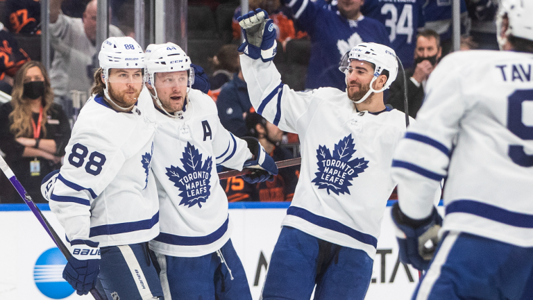 Toronto Maple Leafs' William Nylander (88), Morgan Rielly (44) and T.J. Brodie (78) celebrate a goal against the Edmonton Oilers on Tuesday, Dec. 14, 2021. (CP/file)