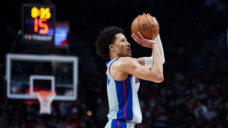 Detroit Pistons guard Cade Cunningham shoots a 3-point basket against the Portland Trail Blazers during the first half of an NBA basketball game in Portland, Ore., Tuesday, Nov. 30, 2021. (Craig Mitchelldyer/AP) 
