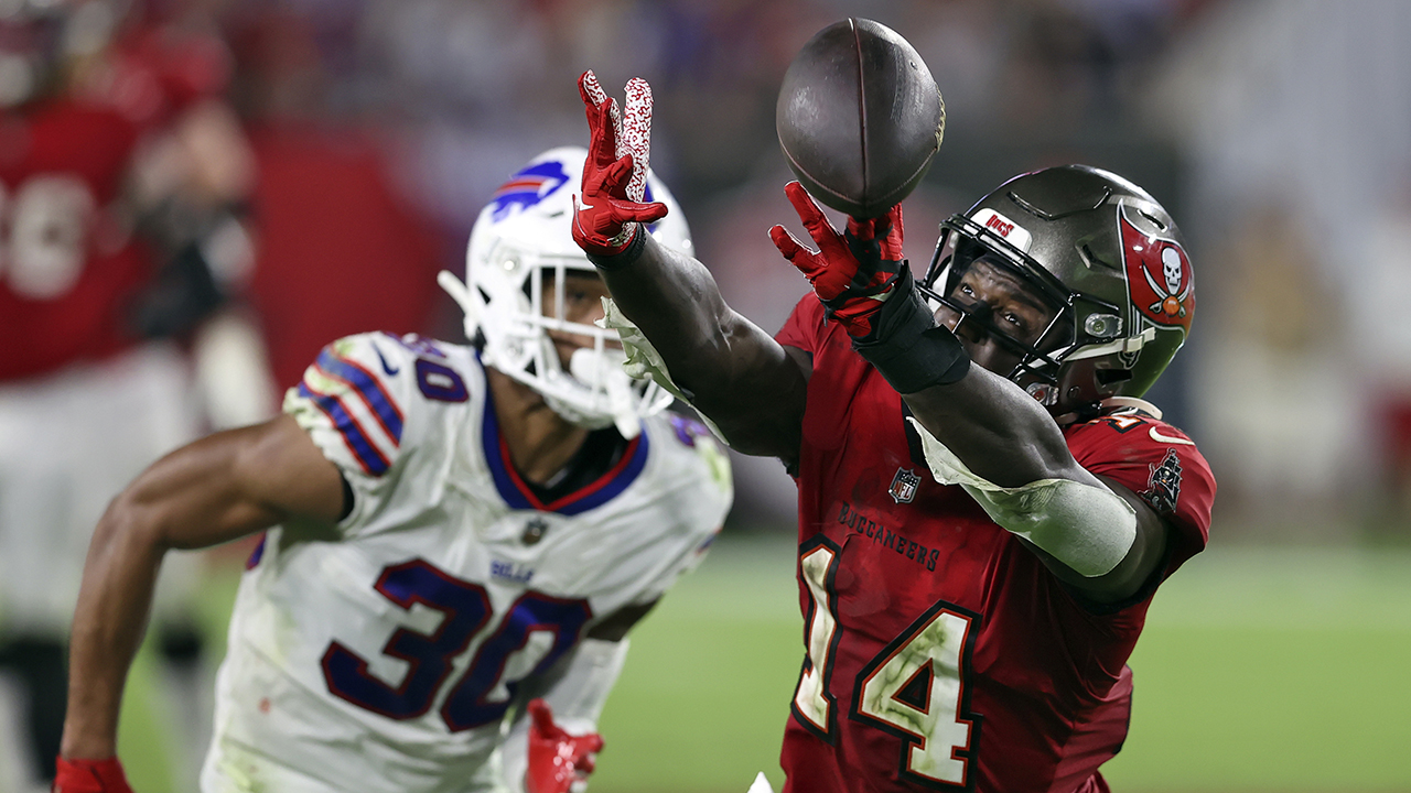 Tampa Bay Buccaneers wide receiver Chris Godwin (12) is stopped by