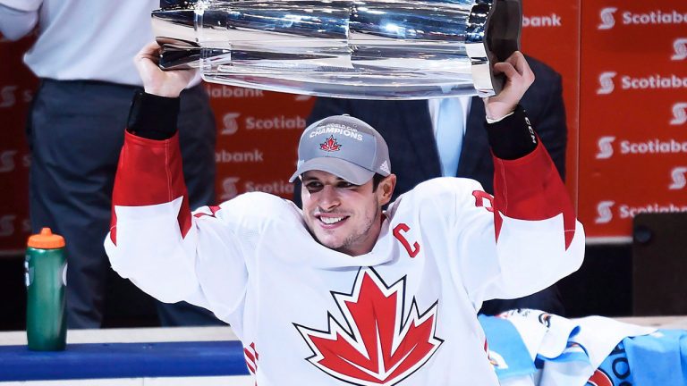 Team Canada's Sidney Crosby (87) hoists the trophy following his team's victory over Team Europe during World Cup of Hockey finals action in Toronto on Thursday, September 29, 2016. (Nathan Denette/CP)