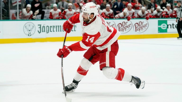 Detroit Red Wings center Robby Fabbri (14) takes a shot in the second period of an NHL hockey game against the Dallas Stars in Dallas, Tuesday, Nov. 16, 2021. (Tony Gutierrez/AP)