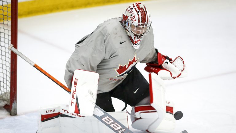 Goalie Dylan Garand makes a stop during a practice at the Canadian World Junior Hockey Championships selection camp. (Jeff McIntosh/CP)