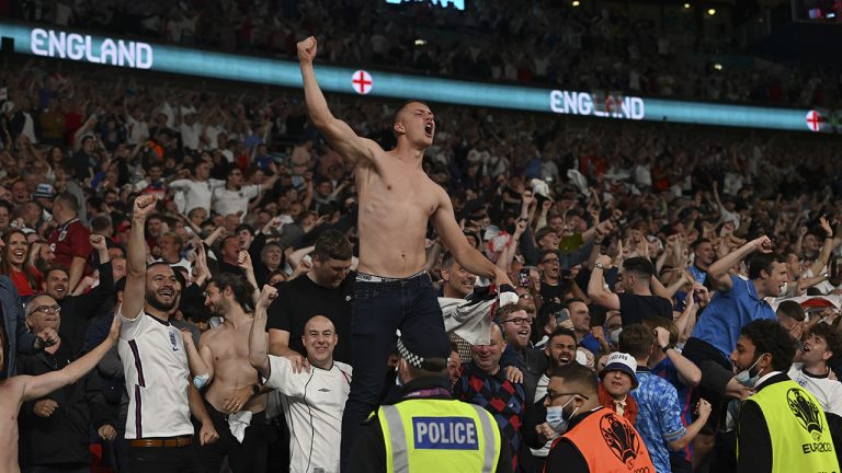 England fans celebrate during a Euro 2020 soccer championship match. (Paul Ellis/AP)