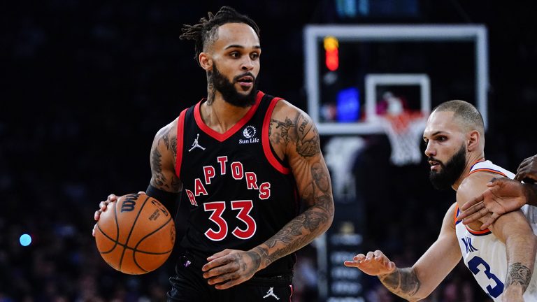 Toronto Raptors' Gary Trent Jr. (33) drives past New York Knicks' Evan Fournier (13). (Frank Franklin II/AP)