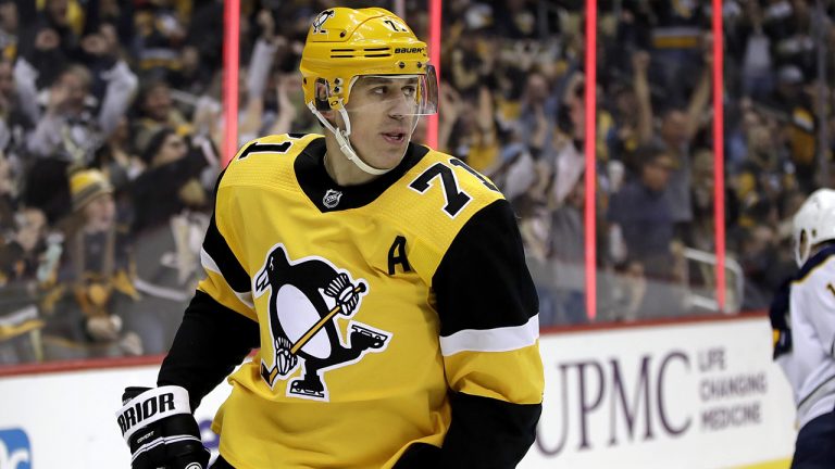 Pittsburgh Penguins' Evgeni Malkin looks for teammates to celebrate his goal with during the second period of the team's NHL hockey game against the Buffalo Sabres. (Gene J. Puskar/AP)