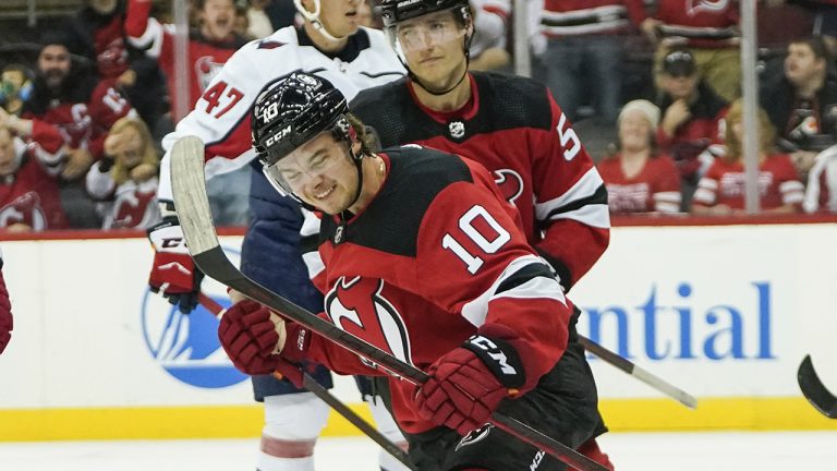 Alexander Holtz (10) celebrates after scoring a goal during the first period of an NHL preseason hockey game. (Frank Franklin II/AP)