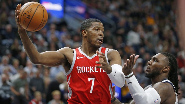 FILE - In this Monday, Feb. 26, 2018 file photo, Houston Rockets guard Joe Johnson (7) passes the ball after pulling down a rebound. (Rick Bowmer/AP)