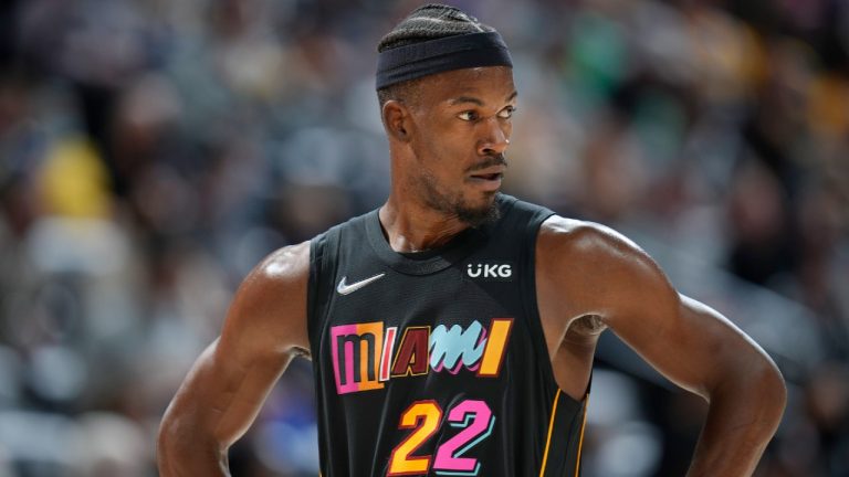 Miami Heat forward Jimmy Butler looks on in the first half of an NBA basketball game against the Denver Nuggets, Monday, Nov. 8, 2021, in Denver. (David Zalubowski/AP) 