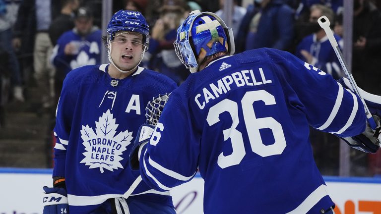 Toronto Maple Leafs forward Auston Matthews (34) celebrates his goal against the Colorado Avalanche with goaltender Jack Campbell (36). (Nathan Denette/CP)