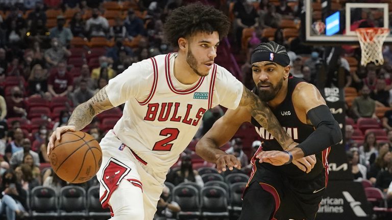 Chicago Bulls guard Lonzo Ball, left, drives to the basket as Miami Heat guard Gabe Vincent, right. (Marta Lavandier/AP)