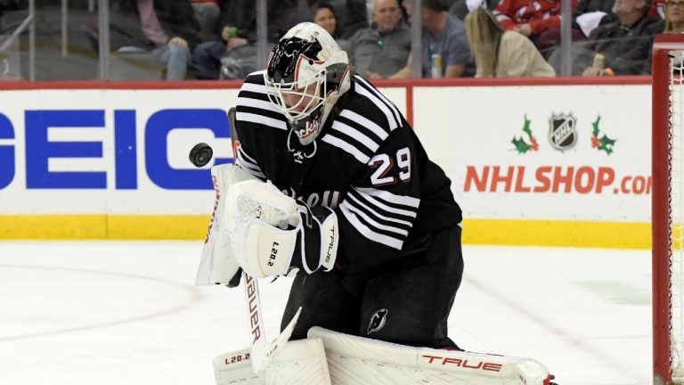 New Jersey Devils goaltender Mackenzie Blackwood (29) stops the puck during the second period of the team's NHL hockey game against the Philadelphia Flyers on Wednesday, Dec. 8, 2021, in Newark, N.J. (Bill Kostroun/AP)