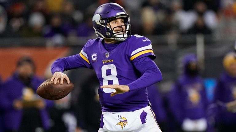 Minnesota Vikings quarterback Kirk Cousins passes during the first half of an NFL football game against the Chicago Bears Monday, Dec. 20, 2021, in Chicago. (Nam Y. Huh/AP)